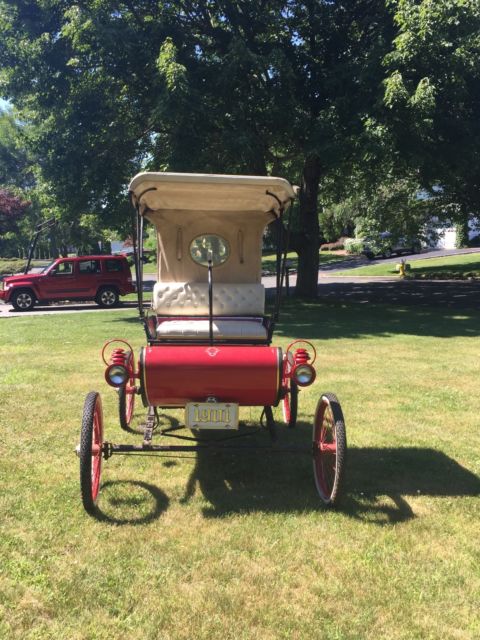 horseless carriage, fire truck, antique, novelty, merry olds ,golf cart,parade