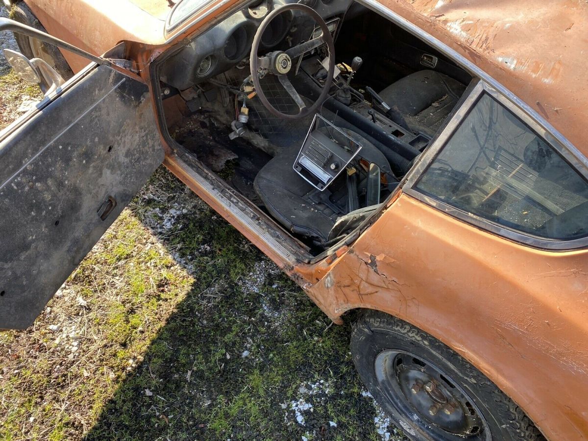 1970 datsun 240z hatchback orange rwd manual 1st series