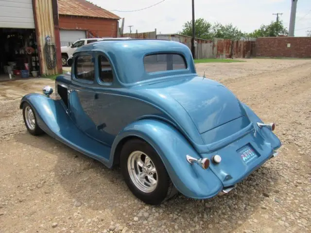 1934 ford 5 window coupe- henry ford steel body. 383 stroker, 2x4 12 bolt. a/c