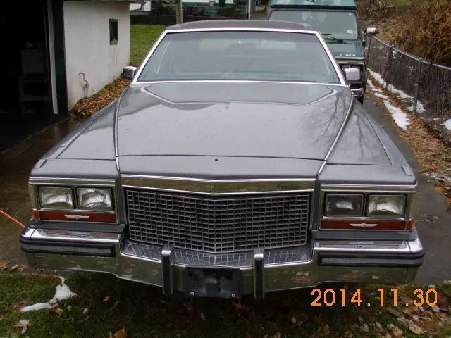 cadillac brougham 1988-103,00 mi.-gray body-full power-engine runs good/quiet