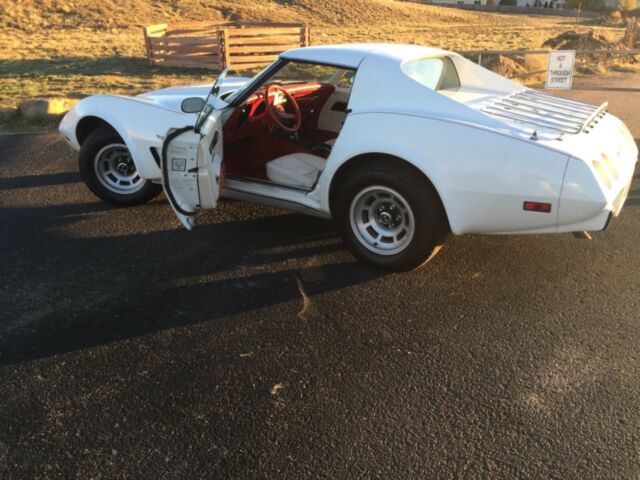 1977 white chevrolet corvette with red leather interior