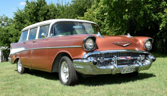 1957 chev 210 station wagon, rebuilt 283, 700 r-4, a/c, ps, new interior