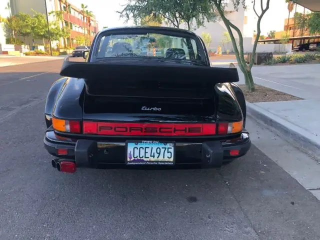 porsche 930 turbo . blk blk , 44123 miles , lots of records . very nice car
