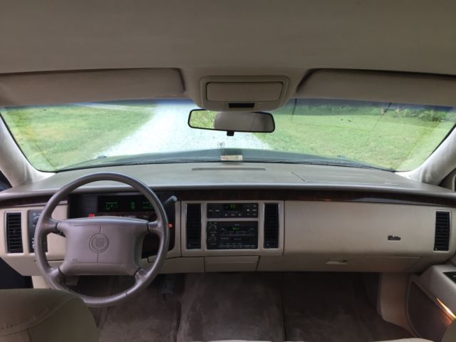 beautiful sage green with tan leather ** clean carfax**