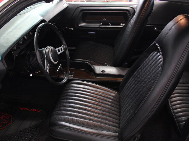 mopar 440ci power, eye seering red paint, ridler wheels, sweet challenger!