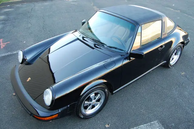 1989 porsche 911 targa black w.tan, only 65k miles. very nice! two owner. g50