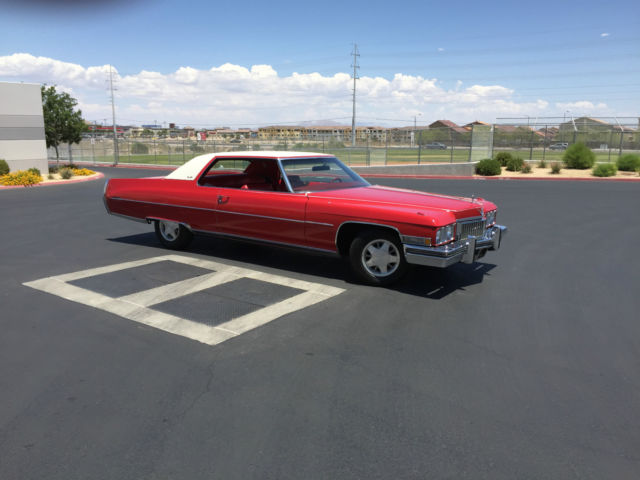 1973 cadillac coupe deville, red with white vinyl top! looks and runs great!