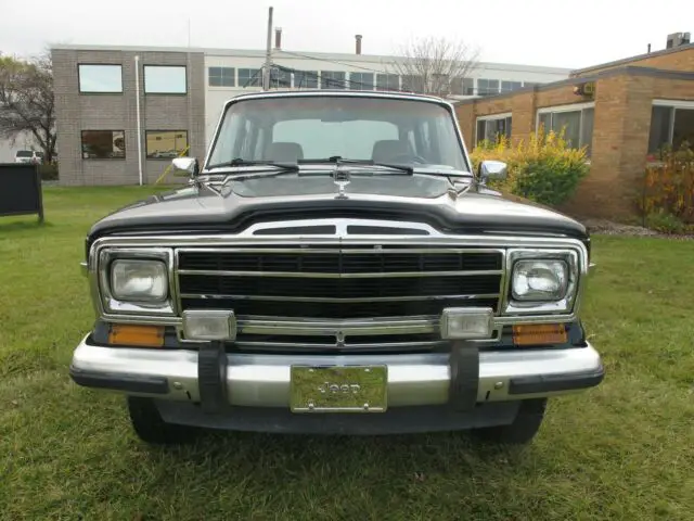 1987 jeep grand wagoneer black w/tan - leather -sunroof