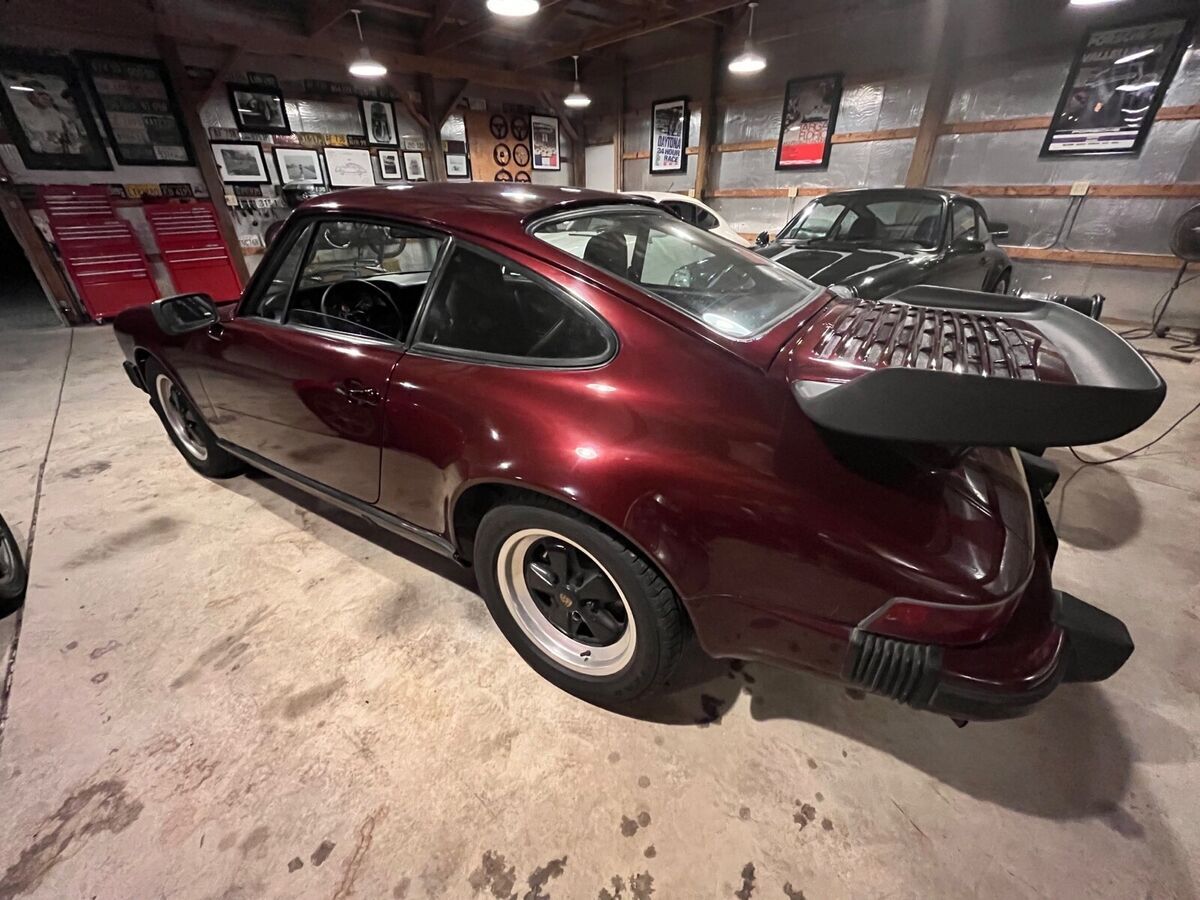 1977 porsche 911 coupe red rwd manual