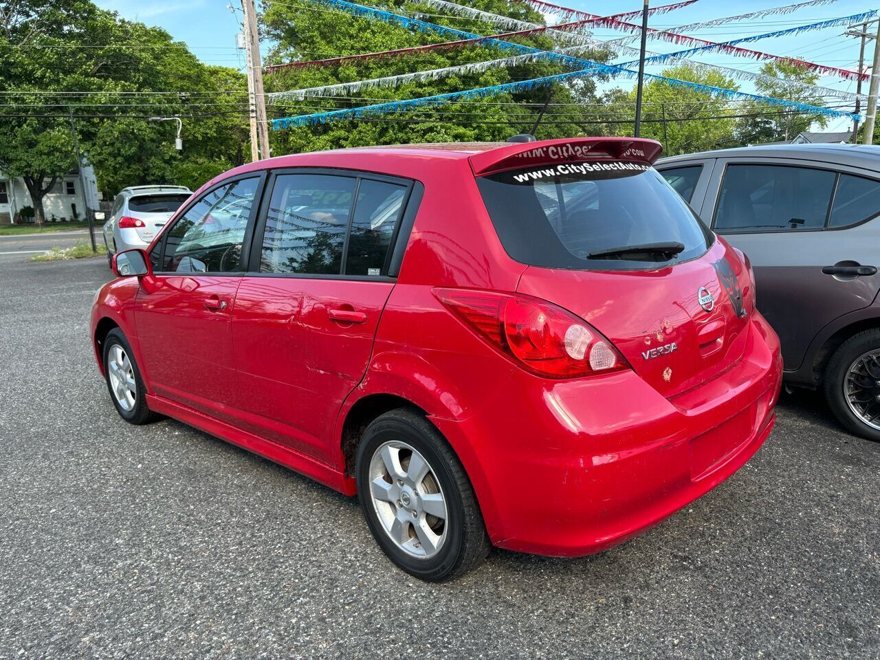 2010 nissan versa 1.8 sl 4dr hatchback