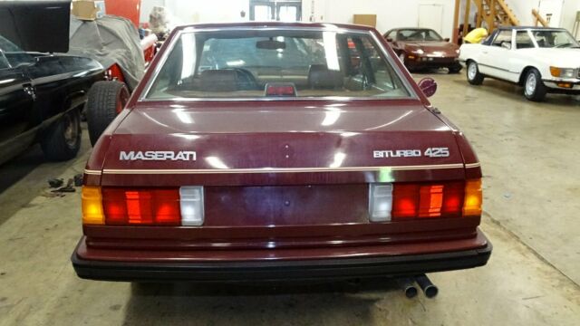 1986 and 1983 maserati bi-turbos one two door manual one four door automatic