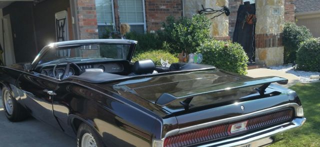 one of a kind 69 cougar convertible with color shifting paint
