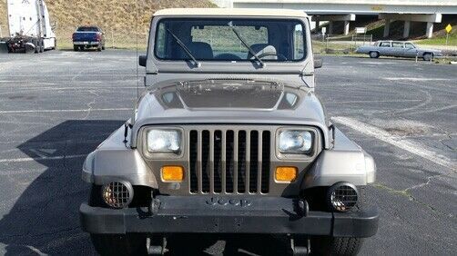 1988 jeep wrangler 72760 miles gold/tan