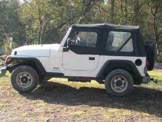 2003 jeep wrangler 4 cyl 5 speed 90,000 miles air 4x4 just serviced in deland, fl