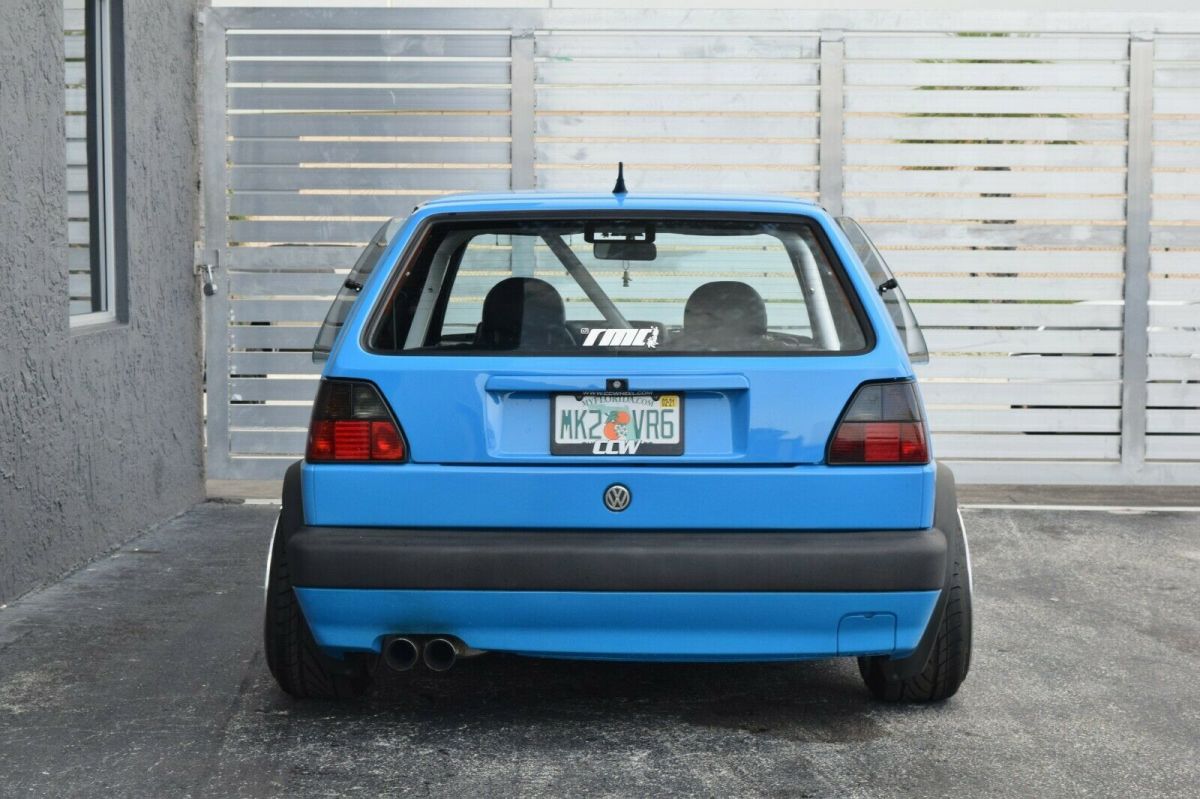 voodoo blue custom paint-airlift suspension-ccw wheels-custom interior-show car