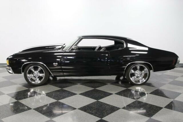 classic vintage chrome black vinyl interior white stripes flowmaster grant hurst