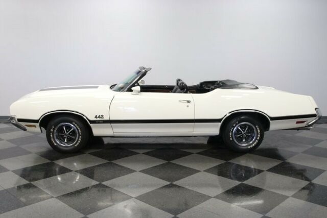 classic vintage chrome restored olds white black vinyl interior drop top muscle