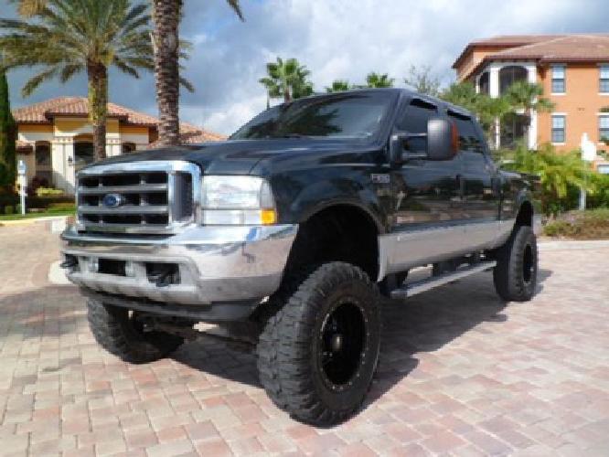 04 ford f250 crew cab 4x4 fx4~lifted on 37"a~clean in sarasota, fl