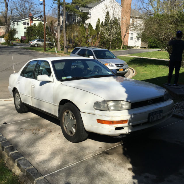 well maintained preowned in good condition white toyota camry