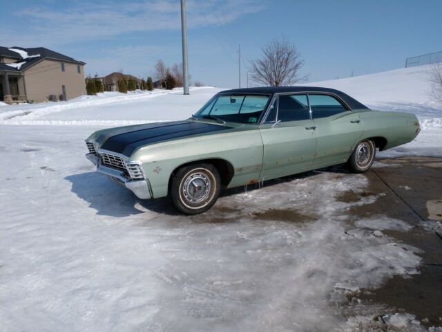 1967 supernatural impala 4 door sport sedan. 327 with a/c. runs great!