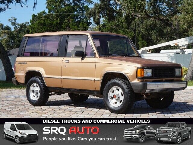 trooper ii deluxe 249546 miles tan 2dr deluxe 4wd suv 2.3l 2.3l i4 96hp 123ft. l