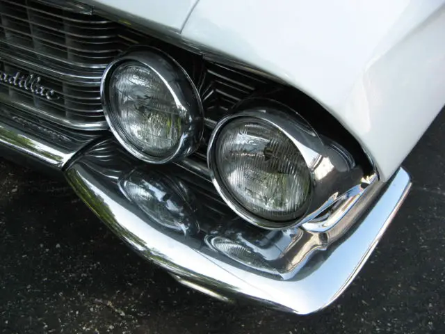 1962 cadillac deville (4 door) white