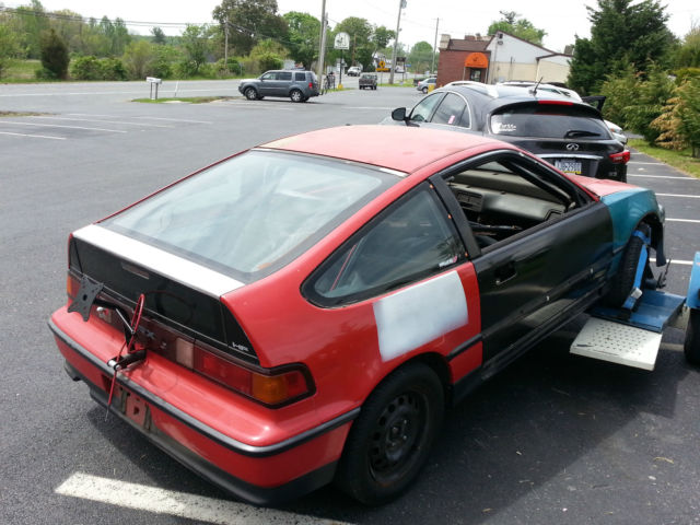 1991 crx hf 10pt caged shell with swing out door bars, chute mount, jojo callos