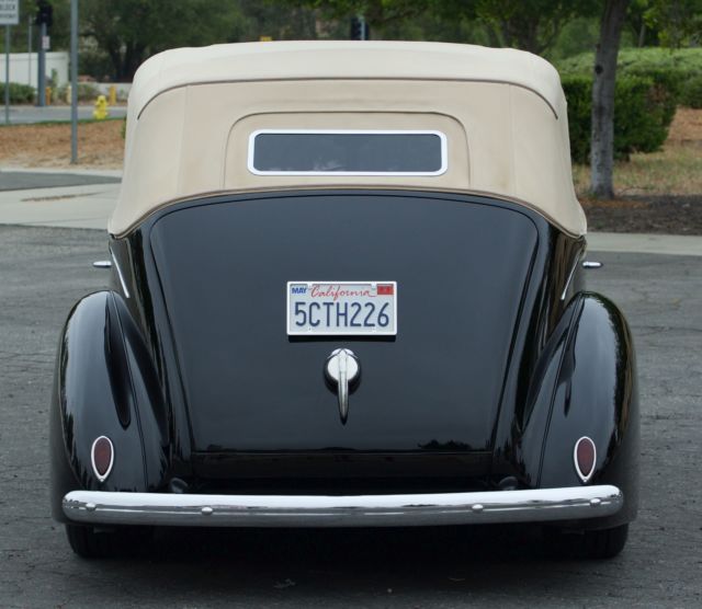 classic 1939 ford 4 door convertible black with tan top