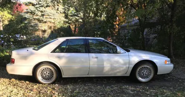 1994 cadillac seville sts - pearl white - only (1) listed on ebay ! rare !