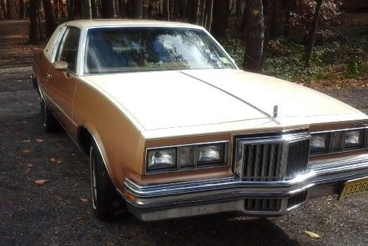 custom 1978 pontiac grand prix, tan/ gold, 70k orig miles/ 5k miles new engine
