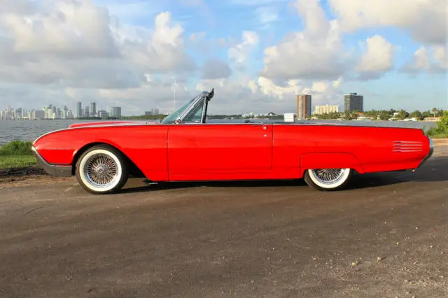 only 63k miles red over black & white leather dayton wire wheels ice cold a/c