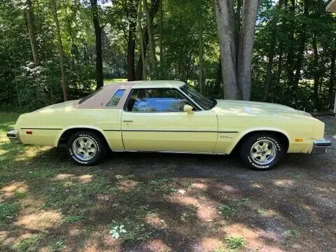 1976 oldsmobile cutlass supreme coupe yellow rwd automatic