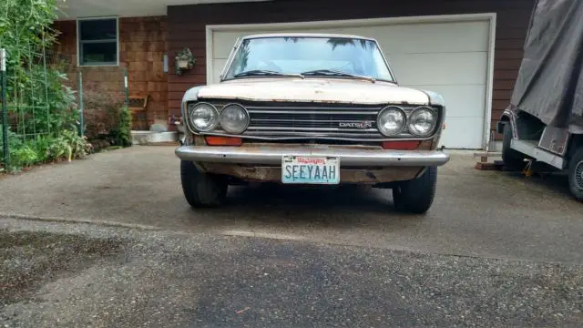 used car>71 datsun 510 2dr - 35 yr project car w/numerous spares, manuals, etc