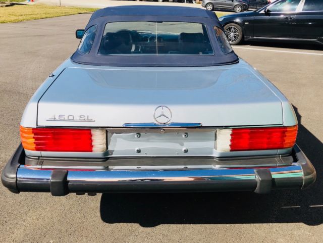 silver blue metallic over navy blue, both tops, rare backseat option, gorgeous!