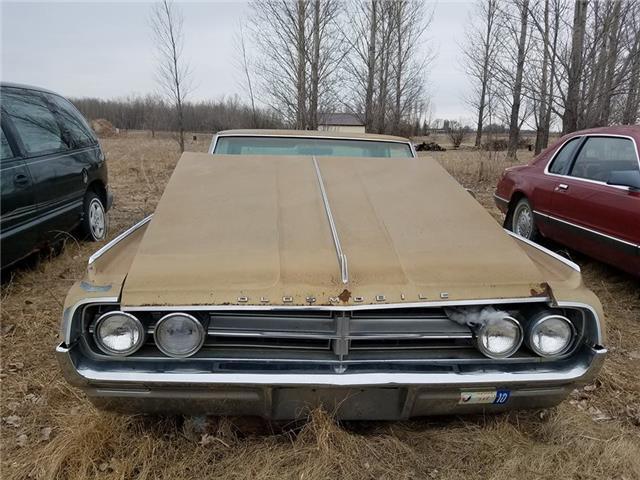 1964 oldsmobile starfire gold automatic
