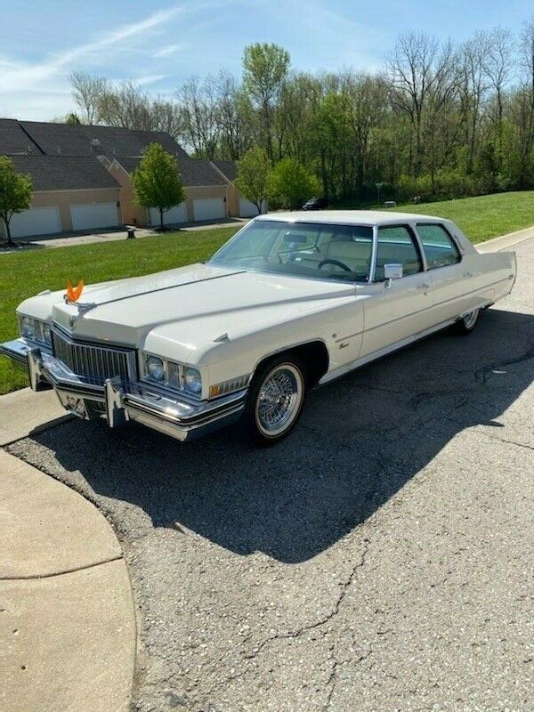 a very clean 1973 fleetwood brougham that's believed to have original miles!!!!!