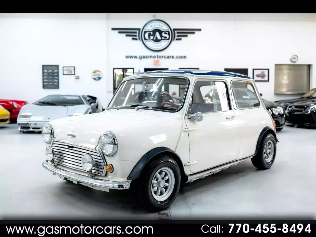 austin mini cooper white with 788 miles, for sale!