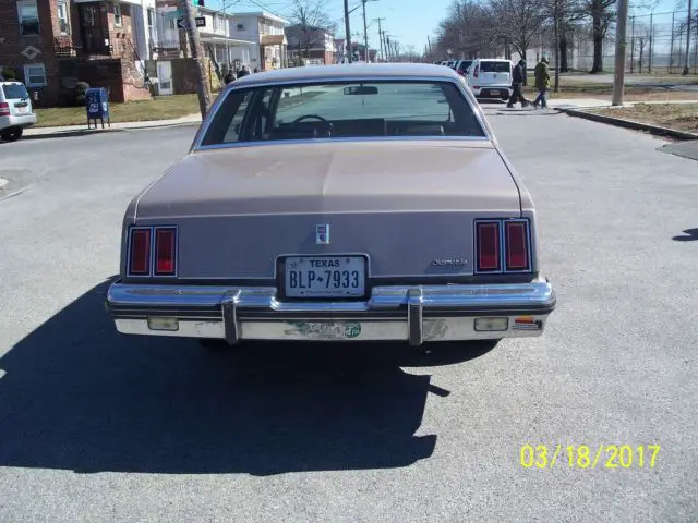 here is a 1984 cutlass supreme 56k 4dr needs bodywork run/drives 3.8 mtr