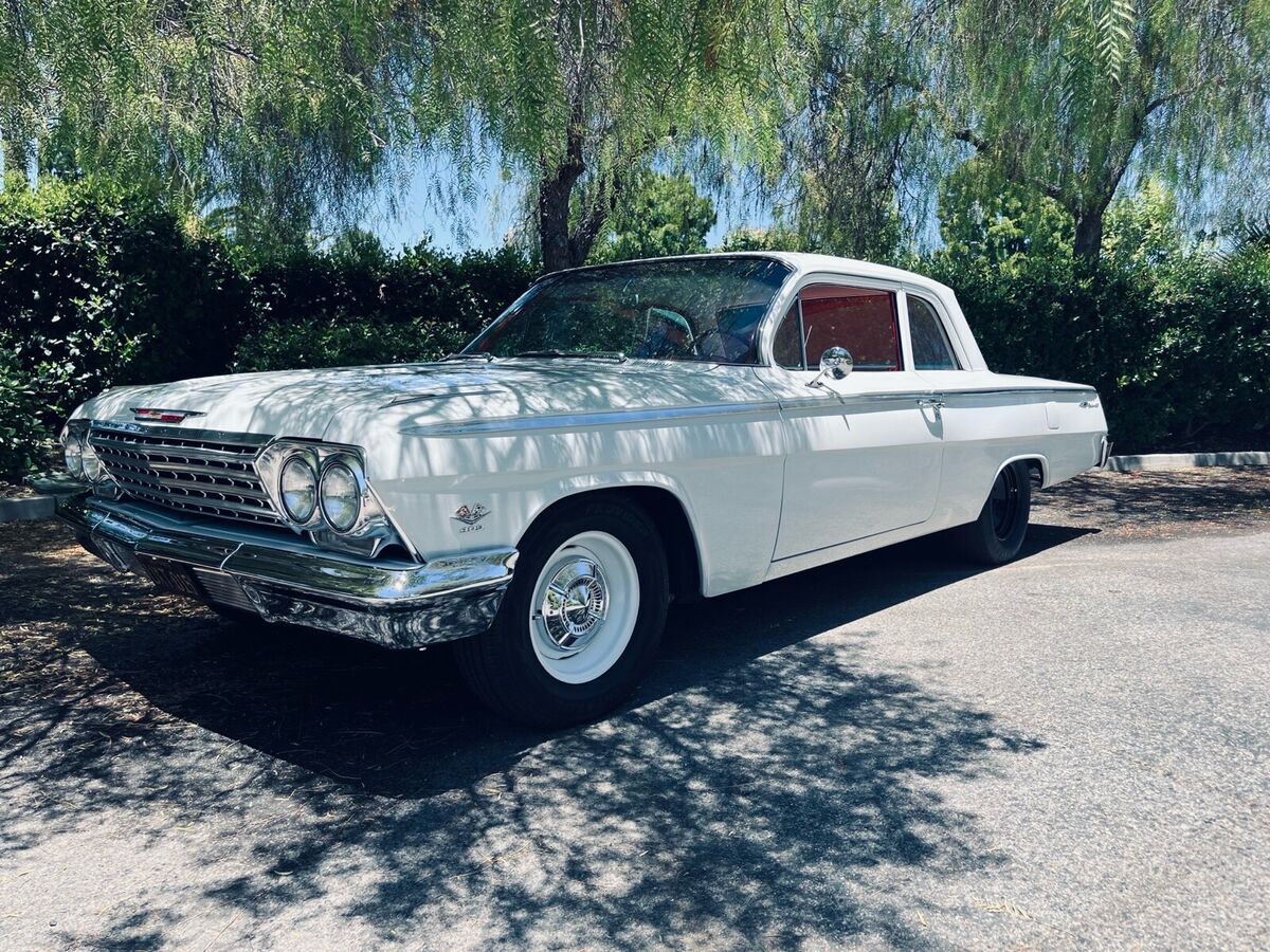 1962 chevrolet bel air white rwd manual red