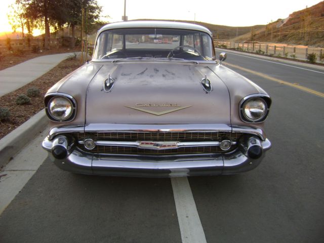 1957 chevy nomad with original paint and moldings.great patina look