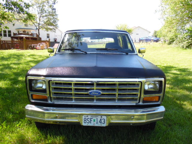 1983 ford bronco that is solid vehicle with black bed liner paint