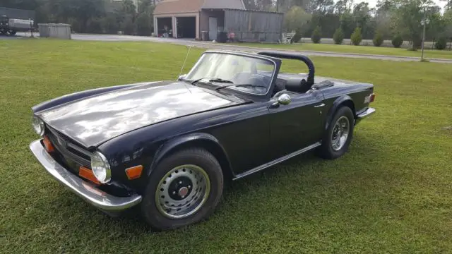 beautiful,restored, triple black triumph tr6