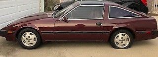 1985 nissian 300zx burgandy/cloth interior brown/ hatchback