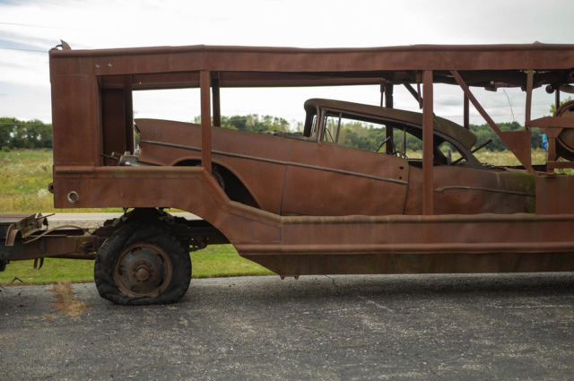 1954 chevrolet car hauler with 1957 chevy rat rod automotive yard art