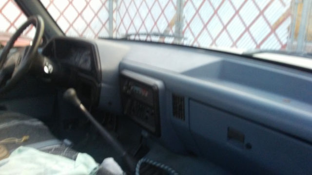 1990 ford f-150 pick up truck gray only 60,000 miles