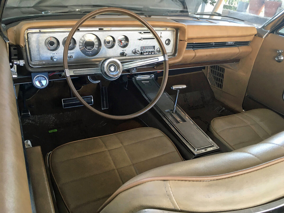 low-mileage, top-of-the-line rare mercury convertible