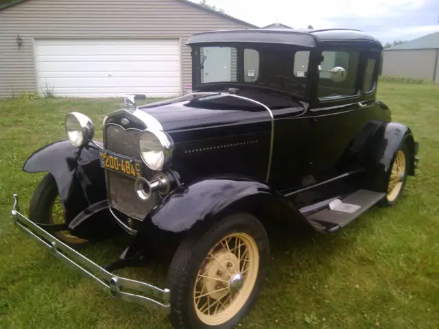 antique ford model a 5 window coupe with rumble seat