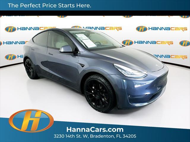 2021 tesla model y standard range rear-wheel drive