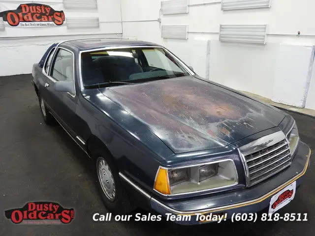 1986 blue elan 5.0lv8 runs drives body int good!