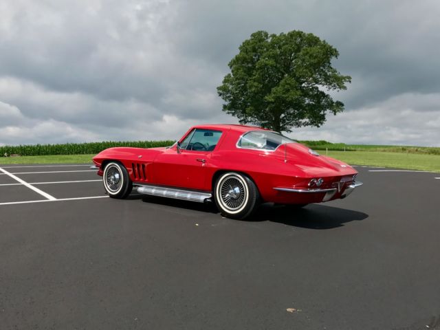 1966 chevrolet corvette *red/black*#smatch327/350hp*4spd*knockoffs*sidepipes*
